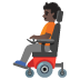 person in motorized wheelchair, dark skin tone